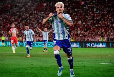 Festejo de uno de los goles del Málaga, que ascendió a la máxima categoría del fútbol español al imponerse por 2-1 sobre