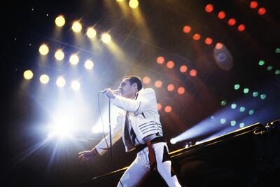 September 18, 1984 showing Rock star Freddie Mercury, lead singer of the rock group "Queen", during a concert at the Palais Omnisports de Paris.