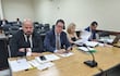 Los abogados Álvaro Arias y José Enrique García, junto a su defendida, la exfiscala Ana Girala, quien afronta juicio oral con otras cinco personas por un supuesto esquema de apriete en la Fiscalía de San Lorenzo.