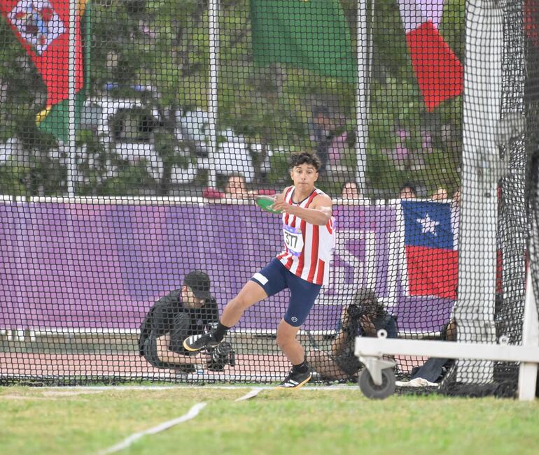 Alexander Männel en la prueba del lanzamiento del disco. (Fotos, redes sociales del COP y SND).