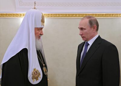 El patriarca de la iglesia ortodoxa rusa, Kiril; y el presidente de Rusia, Vladimir Putin. (archivo)