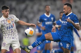 Hilal's Brazilian forward #10 Neymar controls the ball during the AFC Champions League group B football match between UAE's Al-Ain and Saudi's Al-Hilal at the Hazza bin Zayed Stadium in al-Ain on October 21, 2024. (Photo by AFP)