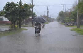 Archivo: Calles anegadas tras una lluvia en Pilar