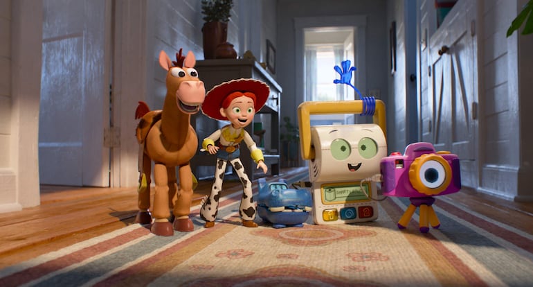 Scene from Toy Story 5 with diverse toys lying on wooden floor, featuring the name SMARTYPANT prominently displayed.