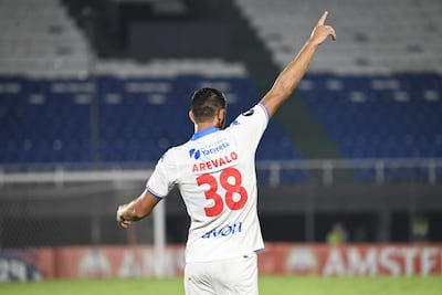 Rodrigo Arévalo, futbolista de Nacional, celebran un gol en el partido frente al Aucas por la Fase 1 de la Copa Libertadores 2024 en el estadio Defensores del Chaco, en Asunción, Paraguay.