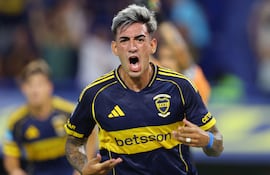 Boca Juniors' defender #02 Lautaro Di Lollo celebrates scoring the opening goal during the Argentine Professional Football League 2026 Apertura Tournament match between Boca Juniors and Deportivo Riestra at La Bombonera Stadium in Buenos Aires on January 25, 2026. (Photo by ALEJANDRO PAGNI / AFP)