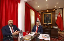 El imputado Orlando Arévalo y el presidente de la ANR, Horacio Cartes.