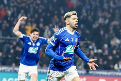 Strasbourgs Paraguayan midfielder #10 Julio Enciso (R) celebrates after scoring a goal during the French Cup round of 16 football match between RC Strasbourg Alsace and AS Monaco at the Stade de la Meinau in Strasbourg, eastern France, on February 5, 2026. (Photo by Frederick FLORIN / AFP)