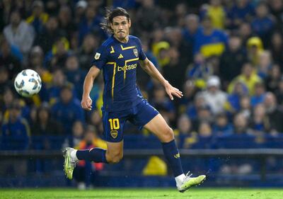 Boca Juniors' Uruguayan forward Edinson Cavani eyes the ball during the Argentine Professional Football League Cup match between Boca Junios and Godoy Cruz at La Bombonera stadium in Buenos Aires on April 16, 2024. (Photo by Luis ROBAYO / AFP)