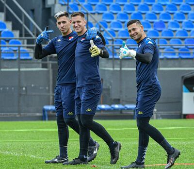 Francisco Peralta Vázquez (izq.), Lucas Ezequiel Galarza y Hernán Domínguez, en la práctica de Nacional.