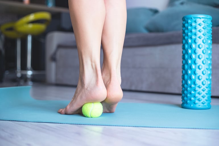 Automasaje con pelotas de tenis.