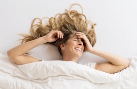 Mujer con expresión de placer.