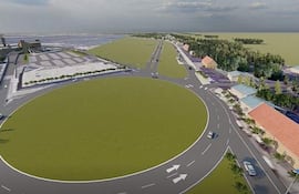 Diseño urbano de rotonda con pavimento y edificios alrededor, en área en desarrollo sin personas visibles.