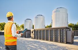 Engineer or technician work at small modular nuclear reactors power plant with energy storage systems