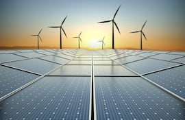 Concepto de energía limpia, paneles fotovoltaicos y turbinas eólicas.