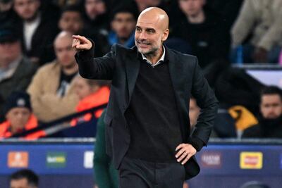 El entrenador español del Manchester City, Pep Guardiola, reacciona durante el partido de fútbol de la UEFA Champions League entre el Manchester City y el Borussia Dortmund en el Etihad Stadium.