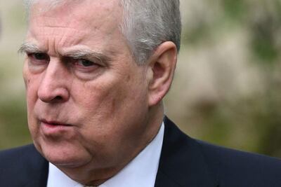 (FILES) Britain's Prince Andrew, Duke of York reacts as he leaves St. George's Chapel, in Windsor Castle, after attending the Easter Mattins Service, on March 31, 2024. King Charles will strip his younger brother Andrew of his royal titles and long-term residence on the Windsor estate, the palace said on October 30, 2025, the latest fallout to hit the scandal-plagued royal over the Jeffrey Epstein affair. "Prince Andrew will now be known as Andrew Mountbatten Windsor," the palace said, adding that Charles had begun the formal process to strip the titles from his brother. (Photo by JUSTIN TALLIS / AFP)