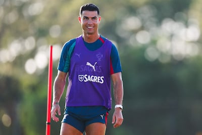 PALM BEACH GARDENS, FLORIDA - JUNE 13: Cristiano Ronaldo #7 of Portugal smiles during a training session ahead of the FIFA World Cup 2026 on June 13, 2026 in Palm Beach Gardens, Florida. Megan Briggs/Getty Images/AFP (Photo by Megan Briggs / GETTY IMAGES NORTH AMERICA / Getty Images via AFP)