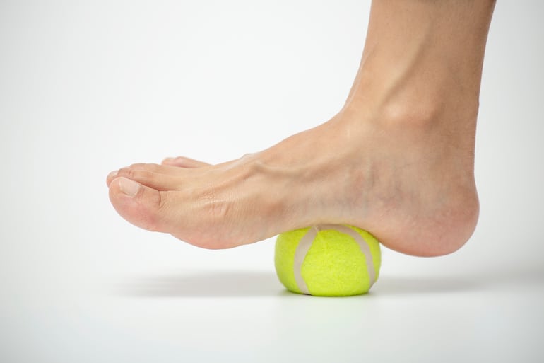 Automasaje con pelotas de tenis.