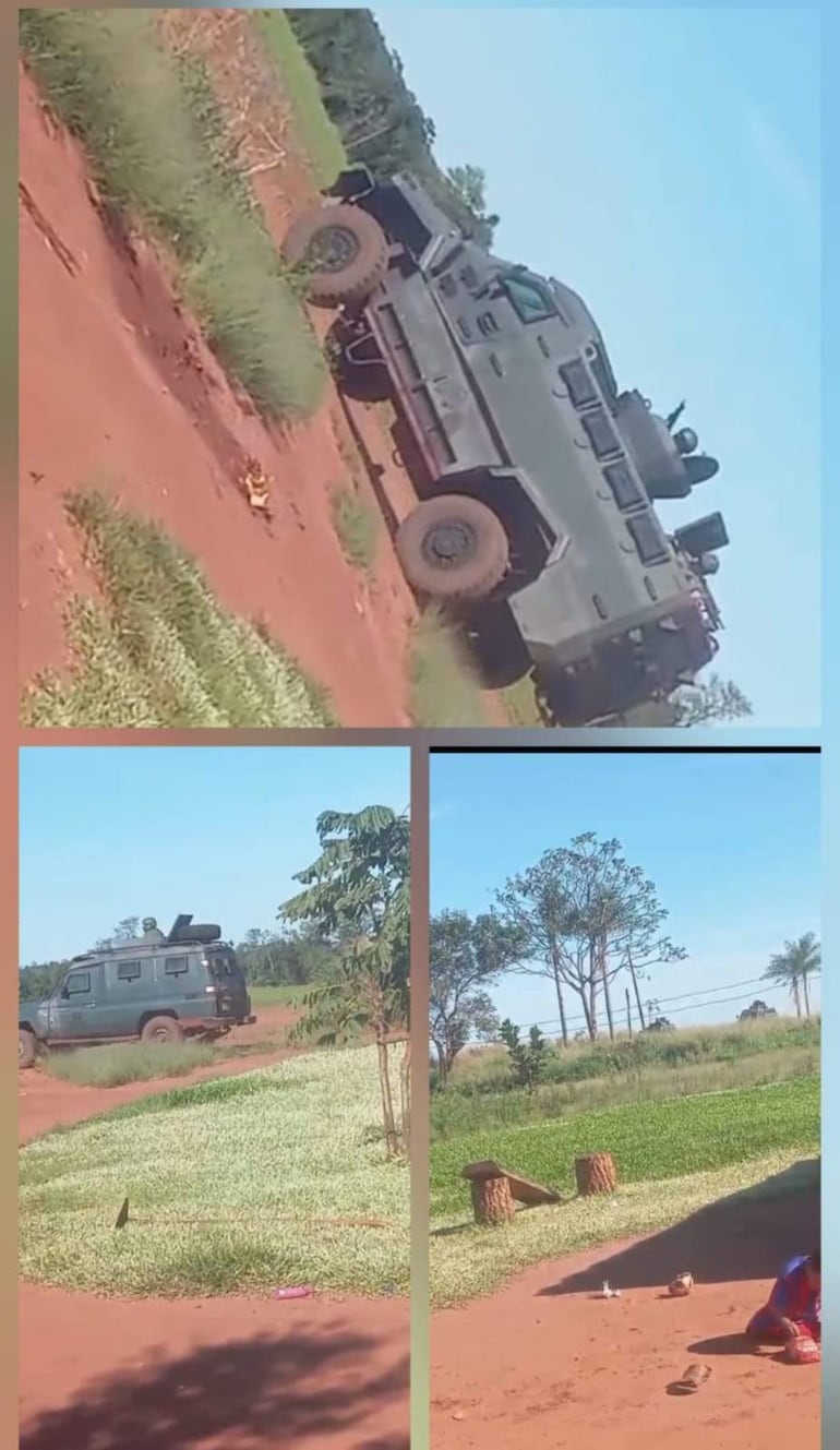 Camioneta blindada verde oscuro en camino rural rodeado de vegetación y cielo despejado.