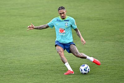 Brazil's national football team winger Raphinha kicks the ball during training session in Brasilia on March 18, 2025,  ahead of the FIFA World Cup 2026 qualifier football match against Colombia on March 20. (Photo by EVARISTO SA / AFP)