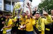 Dortmund fans celebrate in the city prior to the Champions league final Real Madrid vs Borussia Dortmund in London later the day on June 1, 2024. (Photo by Roberto Pfeil / AFP)