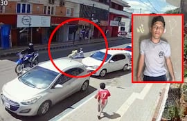 El supuesto asaltante Diego Ariel Segovia Paniagua cae al asfalto tras ser derribado con una piedra y, había sido, también un balazo.