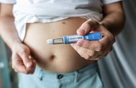 Concepto de obesidad y medicamentos para bajar de peso.