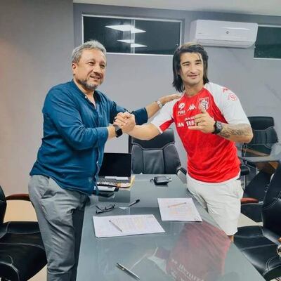 El presidente rojo Julio Aldama con el “Chino” Diego Martínez.