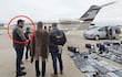 Ingrid Cubilla vestida formalmente junto a Cristian Amarilla con campera de la Senad en el aeropuerto, ambos con expresión tranquila.