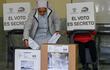A nun votes at a polling station in Quito during the Ecuadorean presidential election and referendum on mining and petroleum, on August 20, 2023. Ecuador holds a presidential election after a campaign marked by the murder of a top candidate and vows to tackle the lawlessness that has engulfed the once-peaceful nation. Alongside the presidential vote, two key referendums are taking place in one of the world's most biodiverse countries. One will ask voters to choose whether to continue oil drilling in the Amazon, and another focuses on whether to forbid mining activities in the Choco Andino forest. (Photo by Camila BUENDIA / AFP)