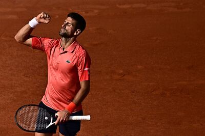 Serbia's Novak Djokovic celebrates his victory over Spain's Carlos Alcaraz Garfia during their men's singles semi-final match on day thirteen of the Roland-Garros Open tennis tournament at the Court Philippe-Chatrier in Paris on June 9, 2023. (Photo by JULIEN DE ROSA / AFP)