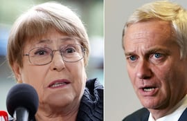 La expresidenta de Chile, Michelle Bachelet (2006-2010 and 2014-2018) jy el actual mandatario, José Antonio Kast.