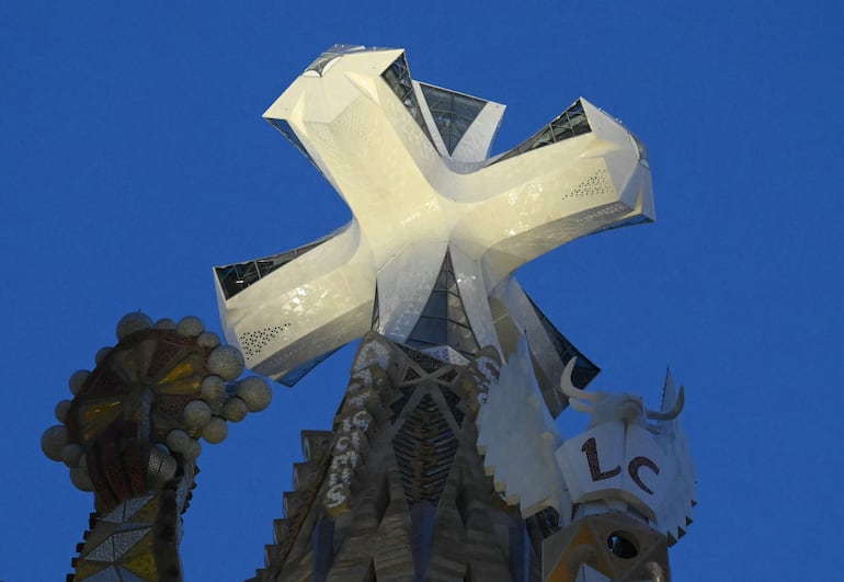 A photo taken in Barcelona, on June 10, 2026 shows a view of the Basilica of the Sagrada Familia during the inauguration of Jesus Christ tower by Pope Leo XIV. Pope Leo XIV is visiting Spain June 6-12 with stops in Madrid, Barcelona, and the Canary Islands, where he will meet with migrants and organisations dedicated to helping them. (Photo by JOSE JORDAN / AFP)