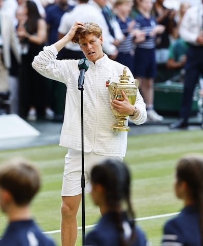 LONDON (United Kingdom), 12/07/2026.- Jannik Sinner of Italy celebrates with the trophy after winning the Men's Singles final against Alexander Zverev of Germany at the Wimbledon Championships in London, Britain, 12 July 2026. (Tenis, Alemania, Italia, Reino Unido, Londres) EFE/EPA/TOLGA AKMEN