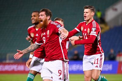 Hungary's forward #09 Martin Adam (C) celebrates after scoring Hungary's first goal during the UEFA Euro 2024 Group G qualification football match between Bulgaria and Hungary, at the Vassil Levski Stadium in Sofia, on November 16, 2023. (Photo by Nikolay DOYCHINOV / AFP)
