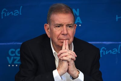 (FILES) Venezuelan opposition presidential candidate Edmundo Gonzalez Urrutia looks on next to opposition leader Maria Corina Machado (out of frame) during a press conference in Caracas on July 25, 2024, ahead of Sunday's presidential election. Opposition leader Edmundo Gonzalez Urrutia, whom the opposition maintains won the 2024 presidential election, said on January 4, 2026, that Venezuelan President Nicolas Maduro's capture "is an important step, but not enough," while also demanding the release of political prisoners. Maduro and his wife, Cilia Flores, were seized by US forces during a pre-dawn raid on January 3 in Caracas and taken to New York to face charges of "narcoterrorism." (Photo by Federico PARRA / AFP)