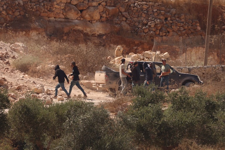 Colonos israelíes en Qusra.