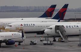 Aeronaves de Delta Airlines. (Photo by Yuki IWAMURA / AFP) (archivo).