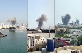 TOPSHOT - (COMBO) This combination of video grabs created on February 28, 2026 and taken from UGC images posted on social media on the same day and verified by AFPTV teams in Paris, shows show the moment of a strike on a US base in Bahrain. A centre for the US Fifth Fleet headquarters in Bahrain has been hit in a "missile attack", Bahrain said on February 28, as Iran vowed retaliation following US and Israeli strikes. (Photo by UGC / AFP) / - Israel OUT / RESTRICTED TO EDITORIAL USE - MANDATORY CREDIT AFP - SOURCE: UGC / UNKNOWN - DISTRIBUTED AS A SERVICE TO CLIENTS - NO RESALE - NO ACCESS ISRAEL MEDIA/PERSIAN LANGUAGE TV STATIONS OUTSIDE IRAN/ STRICTLY NO ACCESS BBC PERSIAN/ VOA PERSIAN/ MANOTO-1 TV/ IRAN INTERNATIONAL/RADIO FARDA - AFP IS NOT RESPONSIBLE FOR ANY DIGITAL ALTERATIONS TO THE PICTURE'S EDITORIAL CONTENT /