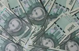 dinero-billete-100-000-guaranies-175342000000-1718953.jpg
