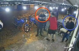 El policía Julio César López Zárate (círculo rojo) y el abogado Ángel Daniel Jaime Galeano (círculo azul), protagonistas del incidente en Cruce Tacuara.