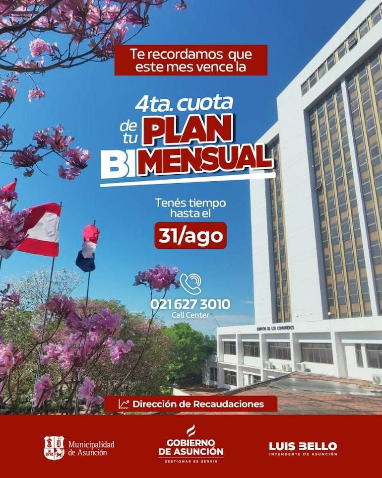Flores rosa en primer plano, con edificio moderno y banderas ondeando. Recordatorio de pago en un día soleado.