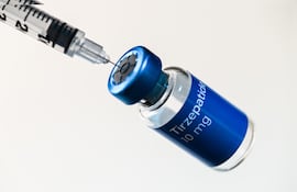 Close,Up,Of,Tirzepatide,Vial,And,Single,Use,Insulin,Syringe