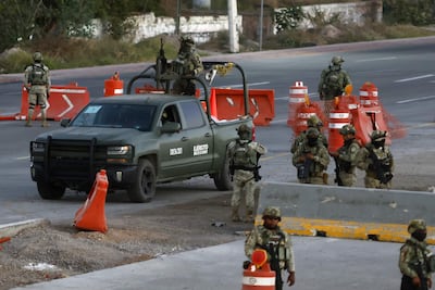 Fotografía del 22 de febrero de 2026 de integrantes del Ejército de México durante un operativo de vigilancia en Guadalajara, en Jalisco (México).