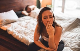 Pareja en la cama.