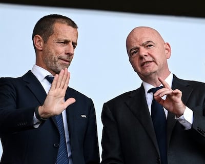 Aleksander Ceferin (izquierda) y Gianni Infantino, presidentes de la UEFA y la FIFA, respectivamente.