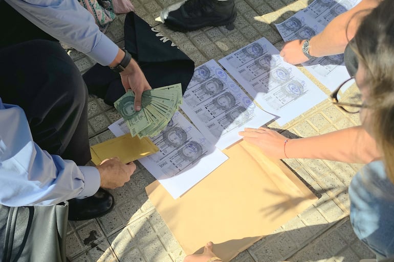 La plata entregada a la funcionaria fue previamente fotocopiada.