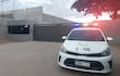 Una patrulla de la Policía Nacional protege la entrada al Deposito de la DNIT en Mariano Roque Alonso.