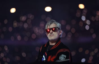 (FILES) French DJ Kavinsky performs on stage during the Paris 2024 Paralympic Games Closing Ceremony at the Stade de France, in Saint-Denis, in the outskirts of Paris, on September 8, 2024. French DJ Kavinsky was found dead at his place in Paris announced Paris' prosecutor's office (Photo by Thibaud Moritz / AFP)
